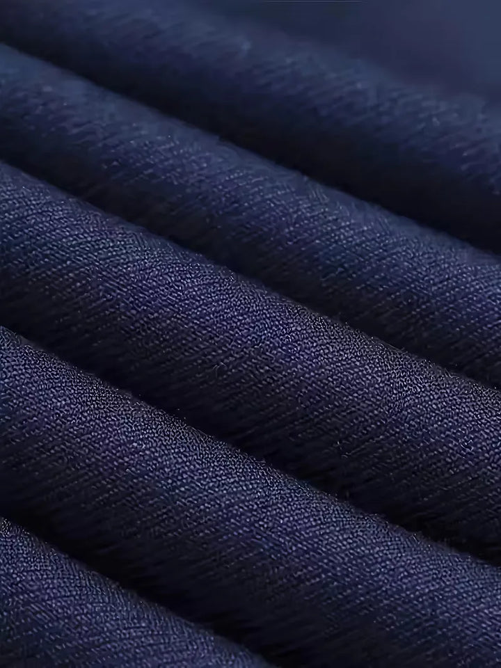Detail of suit fabric texture and smooth woven finish on blazer and waistcoat