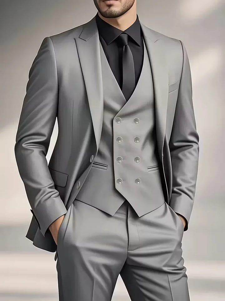 Full-length view of formal three-piece suit in black with complete tailored fit