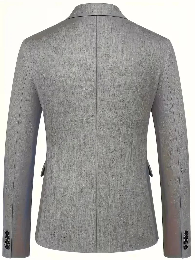 Detail of waistcoat worn under blazer with visible button detailing
