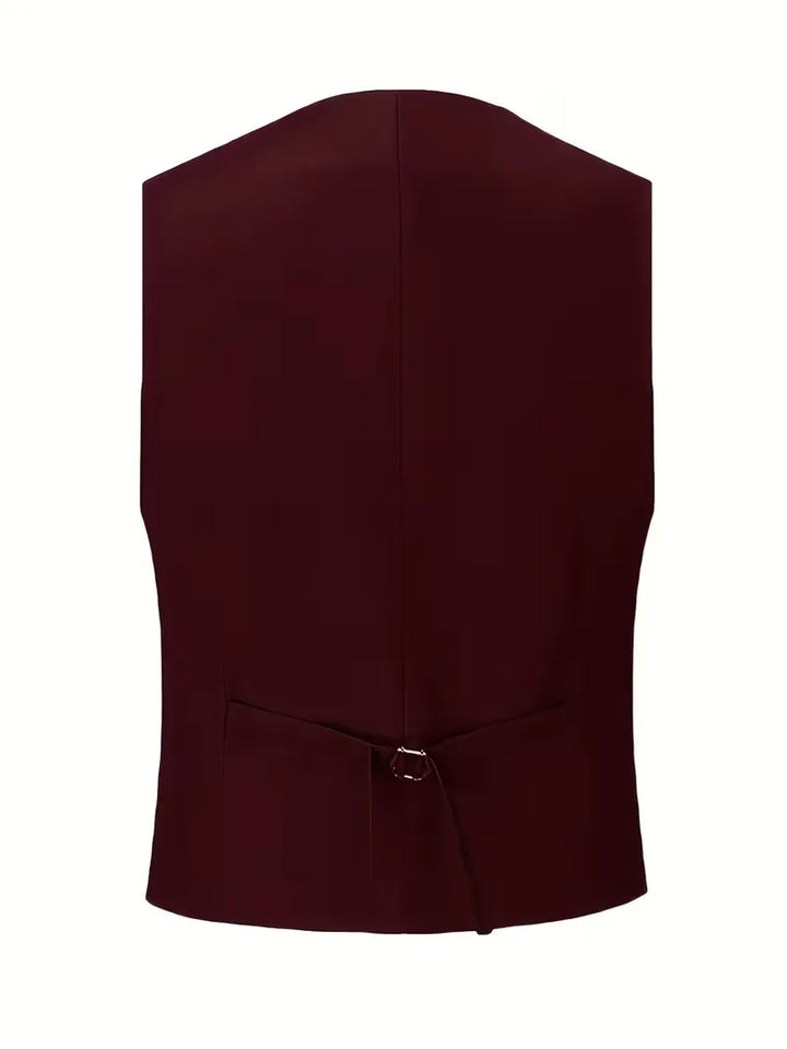 Close-up of double-breasted waistcoat under single-breasted blazer showing layered look