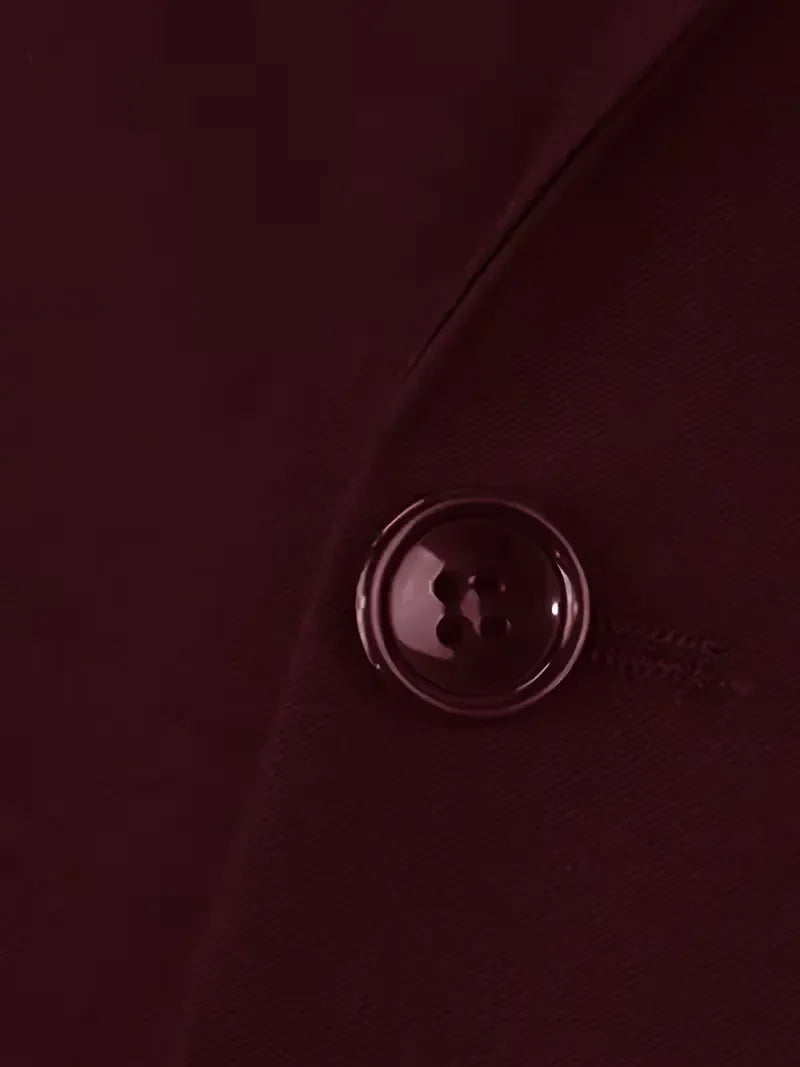 Full-length view of slim-fit three-piece suit with structured tailoring throughout