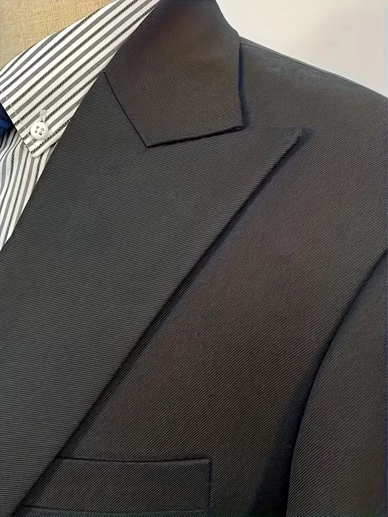 Full-length view of tailored three-piece suit set showing blazer, waistcoat, and trousers