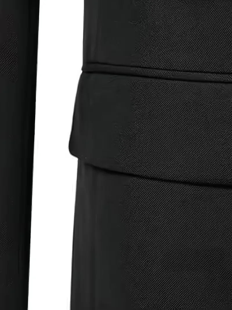 Rear view of three-piece suit showing tailored fit through back and legs