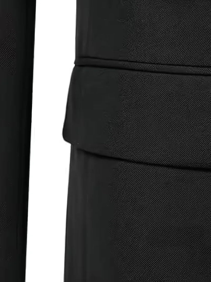 Rear view of three-piece suit showing tailored fit through back and legs