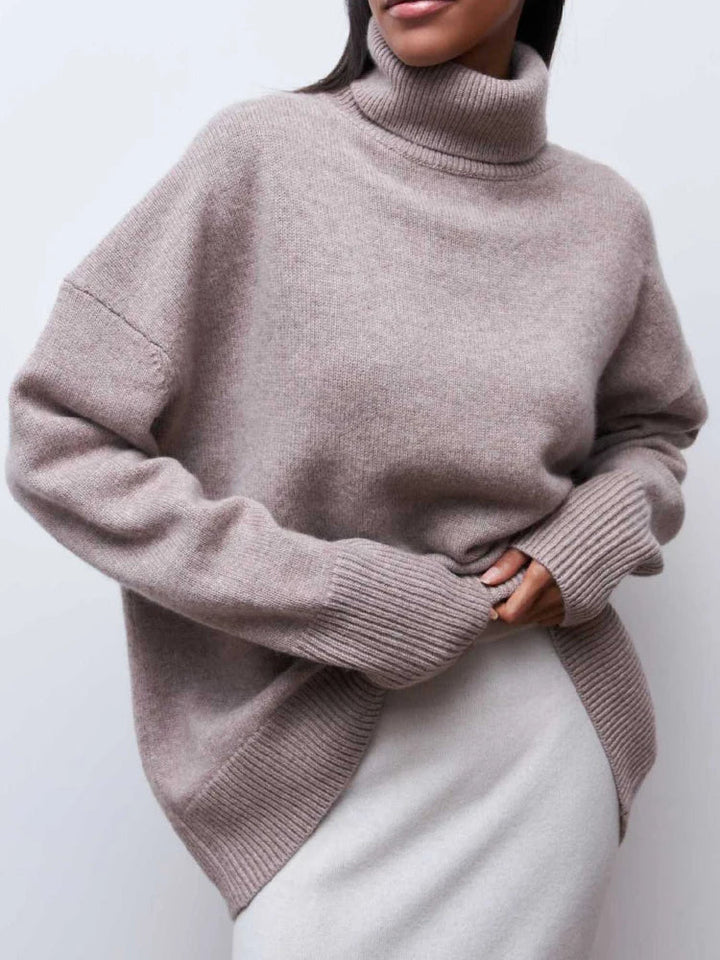 Woman in the camel merino turtleneck jumper showing versatile layering and relaxed fit