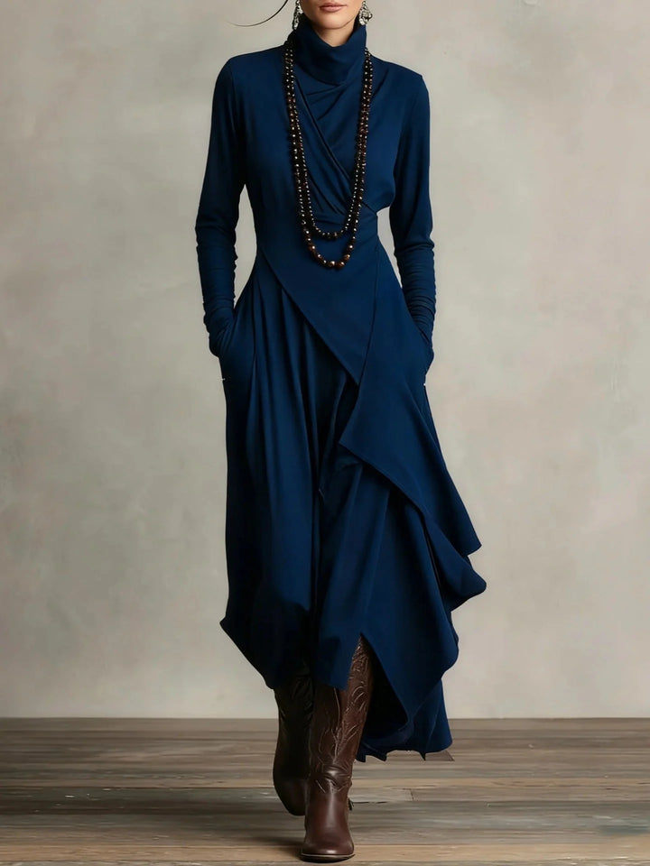 Close-up detail of turtleneck and asymmetric draping on women's maxi dress