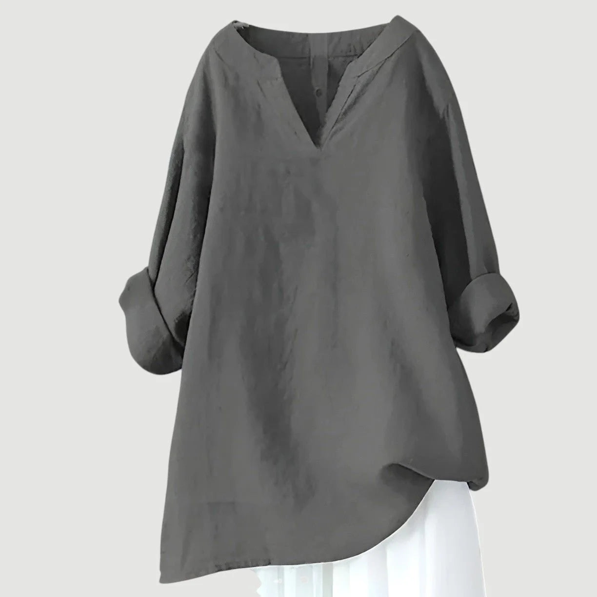 Detail shot of tunic sleeve with roll-up feature and lightweight fabric construction