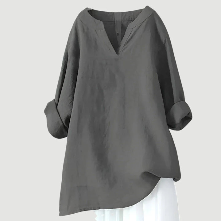 Detail shot of tunic sleeve with roll-up feature and lightweight fabric construction