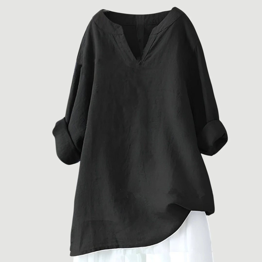 Women's tunic in blue displaying flattering V-neckline and effortless drape for all-day comfort