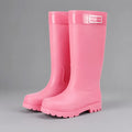 Women's wellington boots in pink with knee-high shaft, glossy finish and chunky non-slip outsole for wet weather