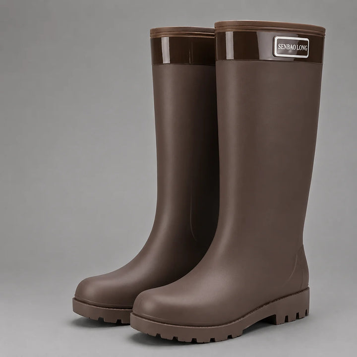 Women's wellington boots shown from multiple angles highlighting fleece-lined interior and waterproof outer shell