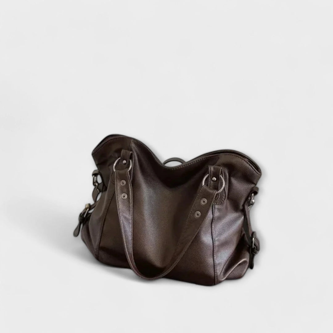 Hobo shoulder bag in lifestyle setting showing versatile carrying options for everyday use