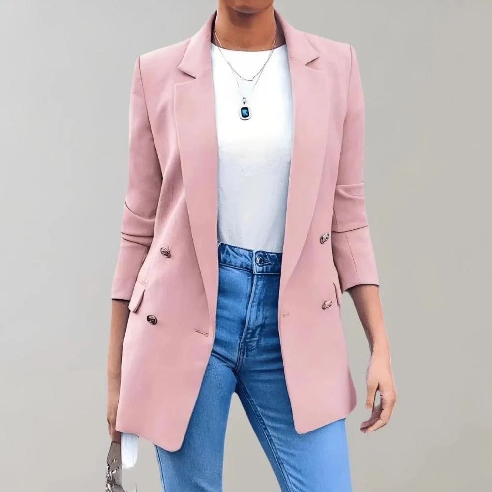 Women's double-breasted blazer in pink with notched lapels and three-quarter sleeves styled with white top