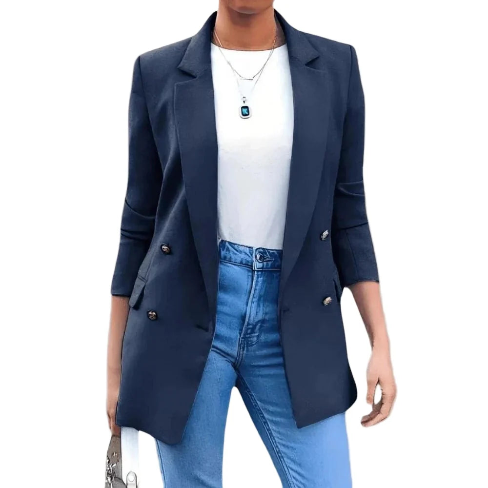 Women's structured blazer paired with blue jeans demonstrating smart-casual styling versatility