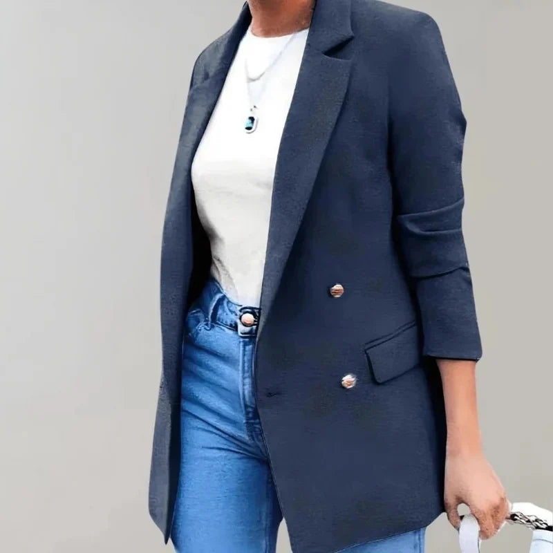 Full-length view of longline blazer showing tailored fit and flap pocket detailing