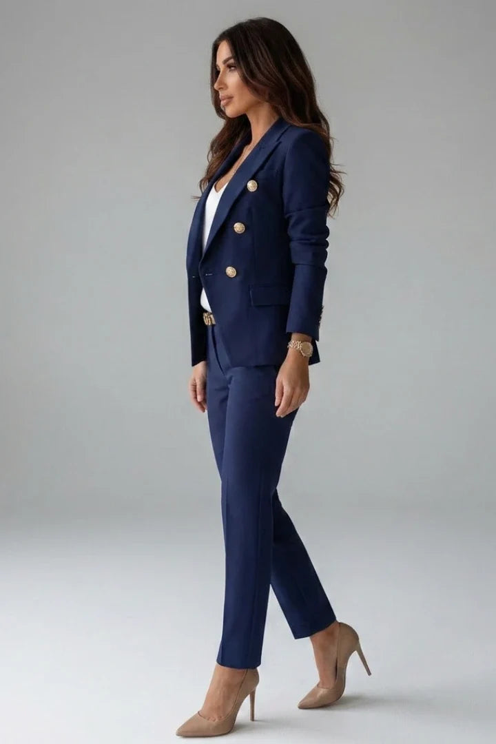 Double-breasted women's suit set in navy showing blazer front detail and trouser fit