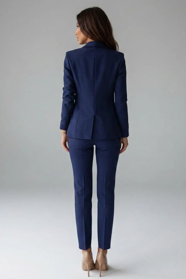 Structured navy blazer suit set with cinched waist and straight-leg trousers for office wear