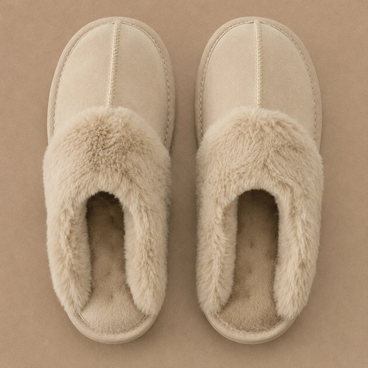 Close-up of women's mule slippers showing faux fur collar and cushioned footbed detail