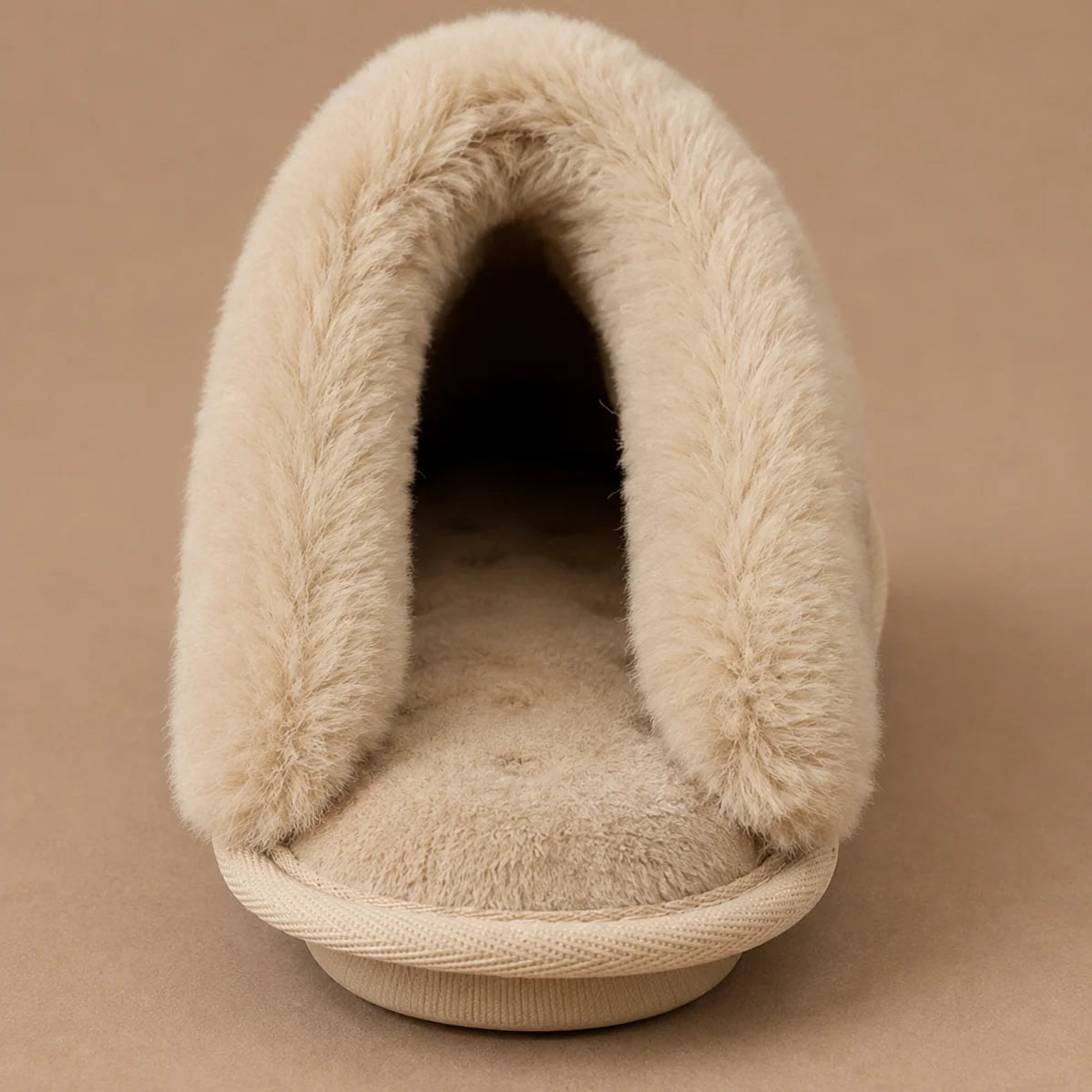 Side view of women's mule slippers with open-back design and flexible sole