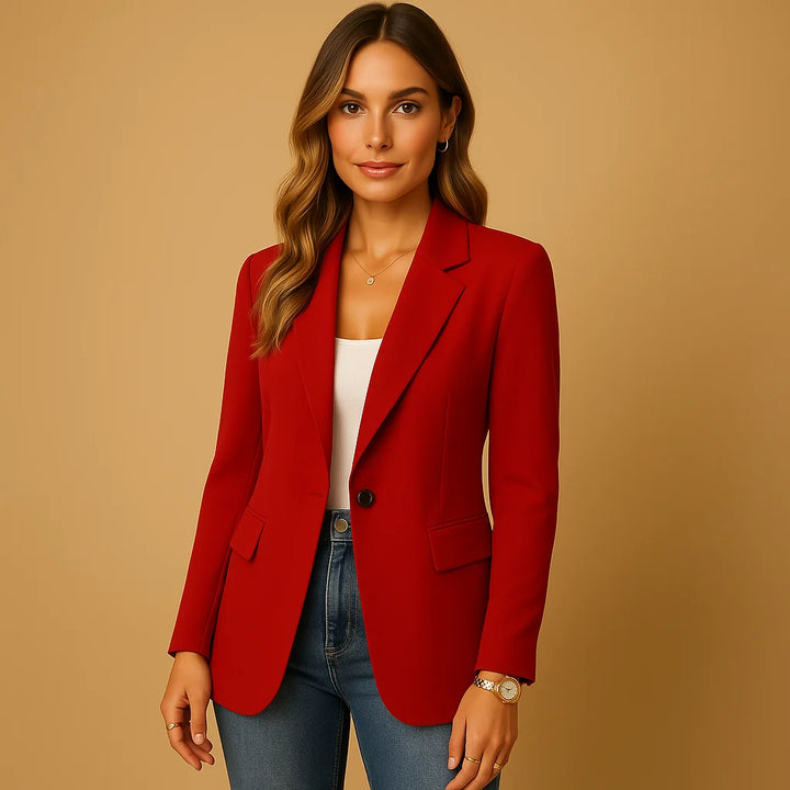 Side view of women's fitted blazer showing structured shoulders and tailored waist silhouette