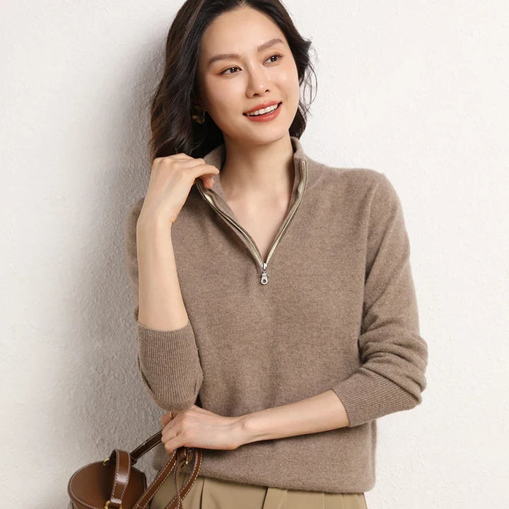 Close-up of ribbed cuffs and hem on women's cashmere zip up jumper