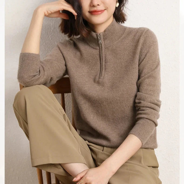 Women's cashmere zip up jumper in camel tone showing soft knit texture