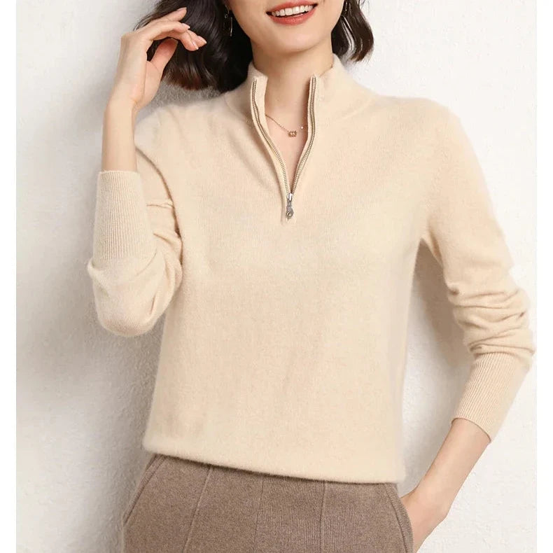 Three-quarter view of women's cashmere zip up jumper displaying half-zip neckline