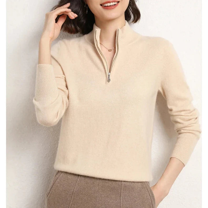 Three-quarter view of women's cashmere zip up jumper displaying half-zip neckline
