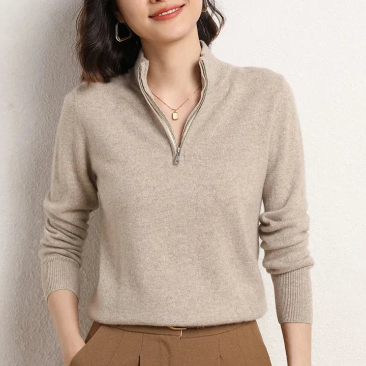 Women's cashmere zip up jumper worn with zip partially open showing layering potential