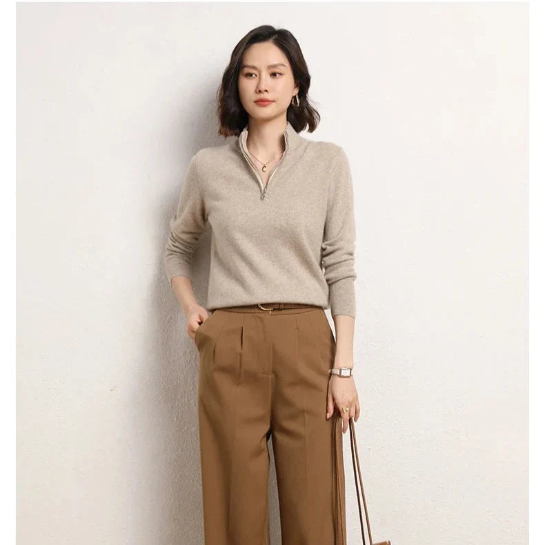 Women's cashmere zip up jumper showing relaxed fit through shoulders and torso