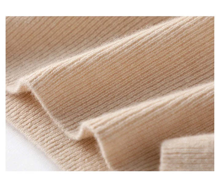 Full-length view of women's cashmere zip up jumper paired with wide-leg trousers