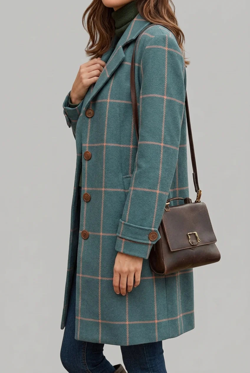 Teal check women's coat longline cut styled with jeans and handbag for autumn outfits