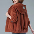 Women's corduroy hooded jacket in rust with zip-front closure and patch pockets