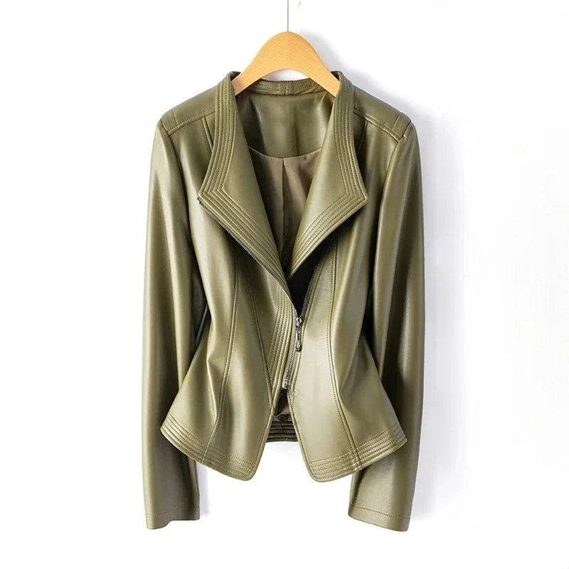 Close-up of women's leather biker jacket showing ribbed stitch detailing and structured collar