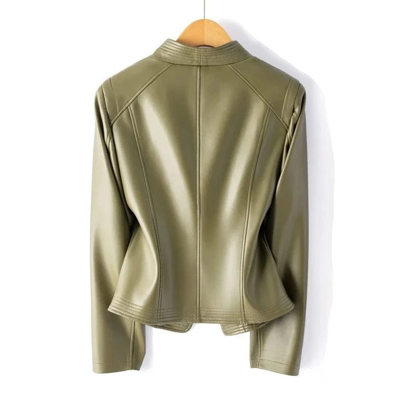 Side view of burgundy faux leather jacket displaying tailored fit and hip-length hem