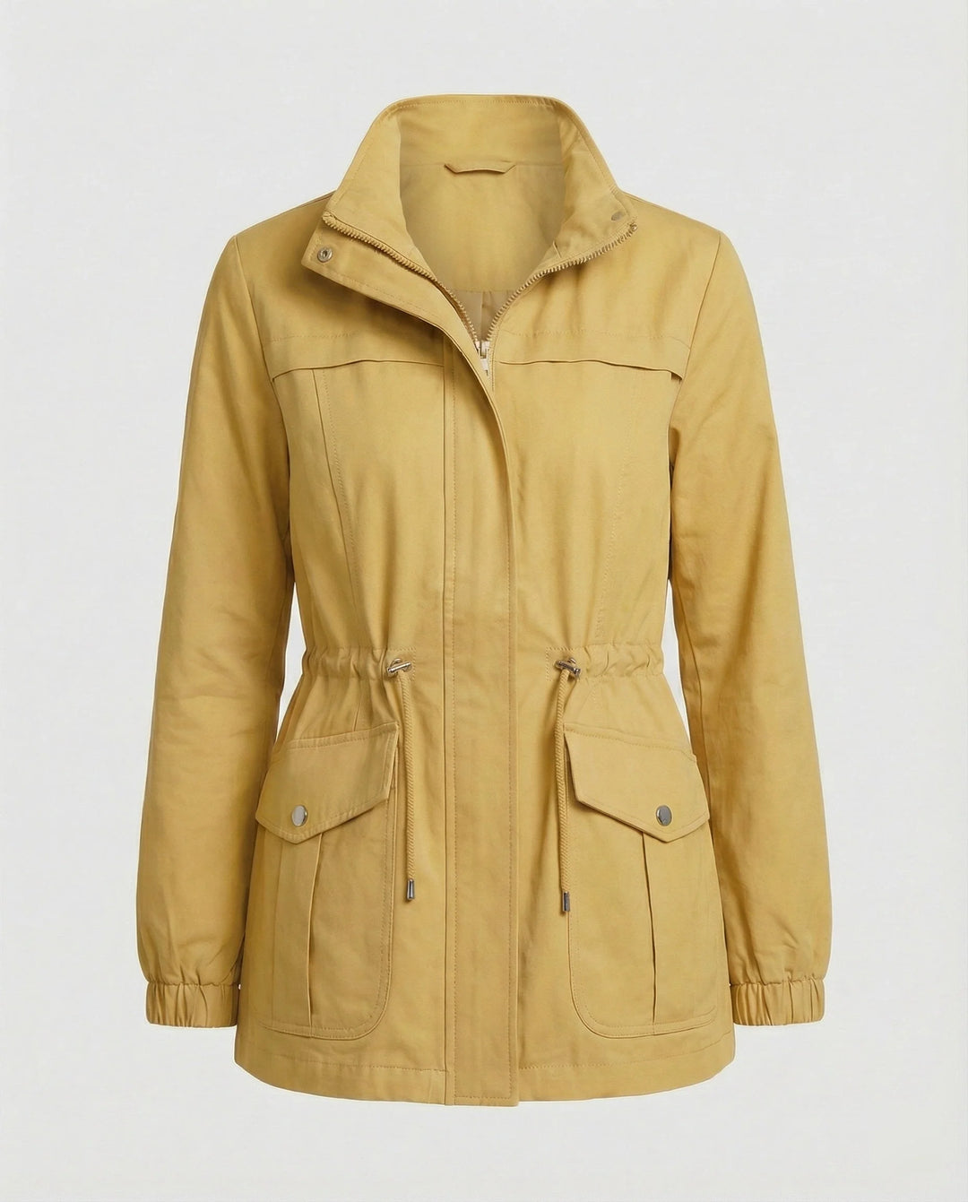 Close-up of large flap pockets with military-inspired detailing on utility jacket