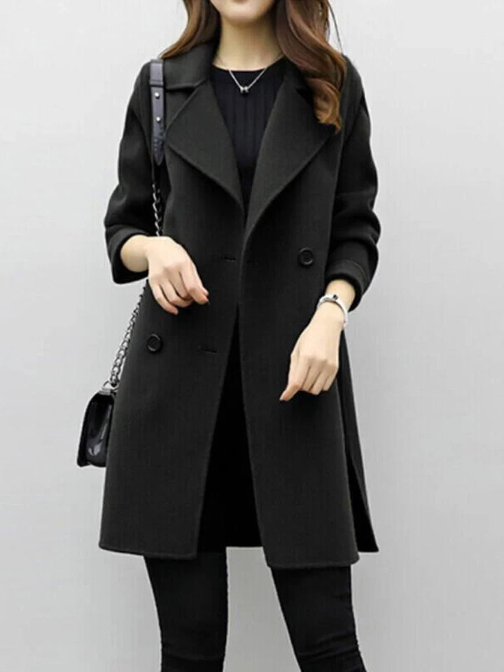 Women's longline coat in black colourway with classic double-breasted button detail