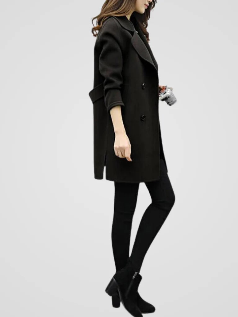 Full-length view of women's structured longline coat showing knee-length cut and relaxed fit