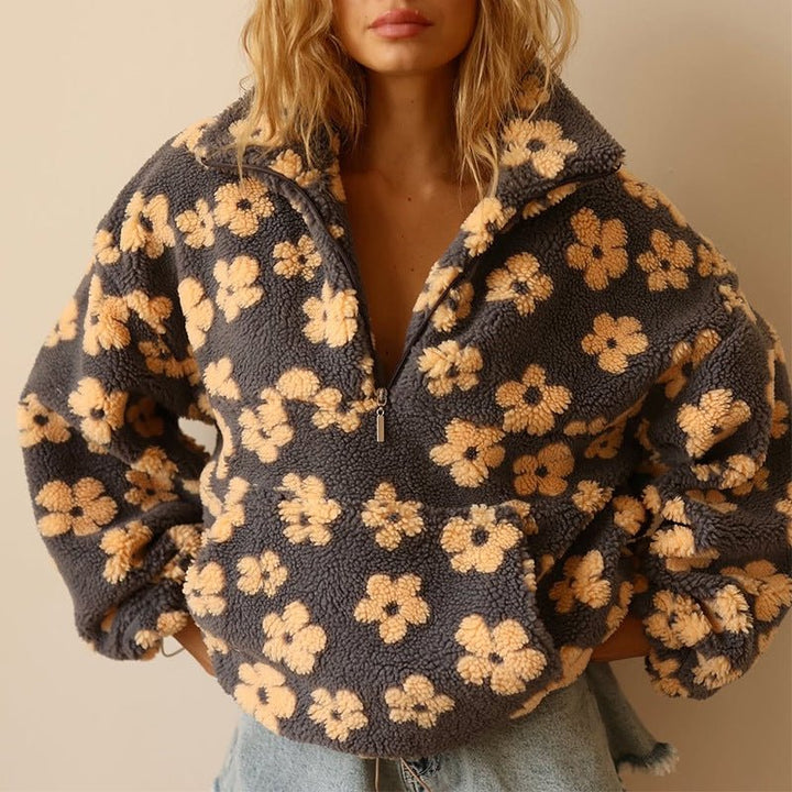 Women's oversized floral fleece jacket with retro daisy print and half zip front closure