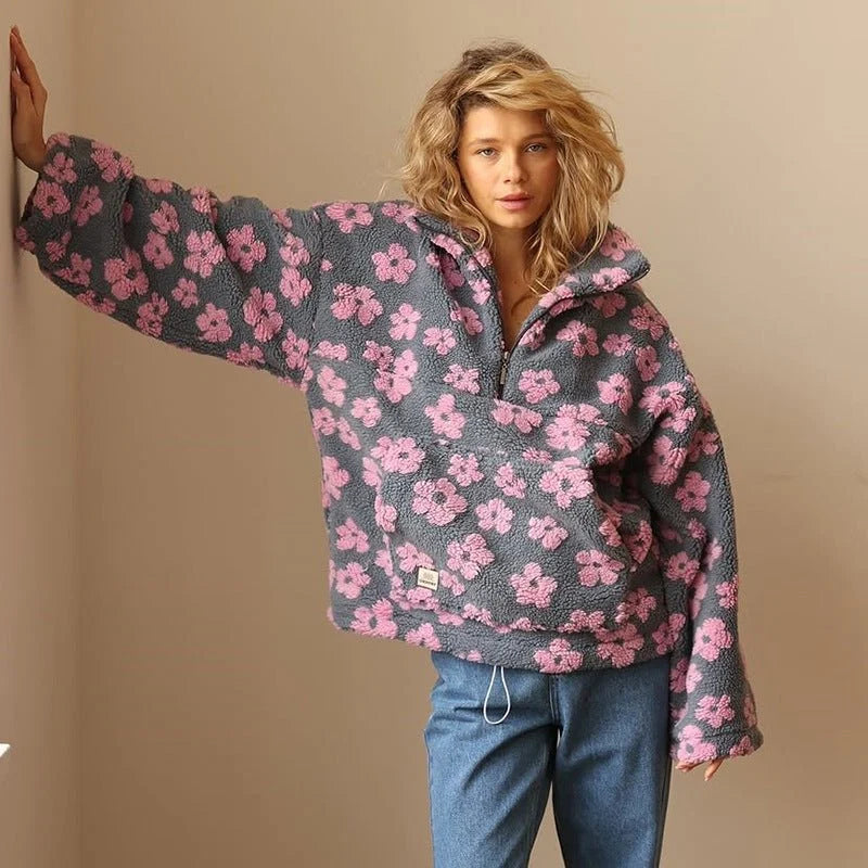 Women's floral fleece jacket styled with denim for casual everyday layering look