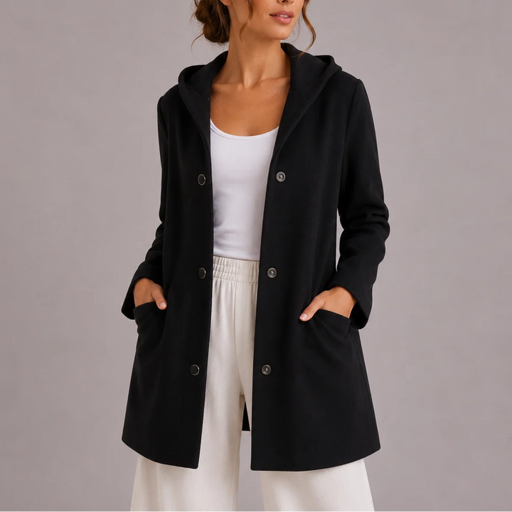 Side view of women's hooded jacket with mid-thigh length and relaxed silhouette