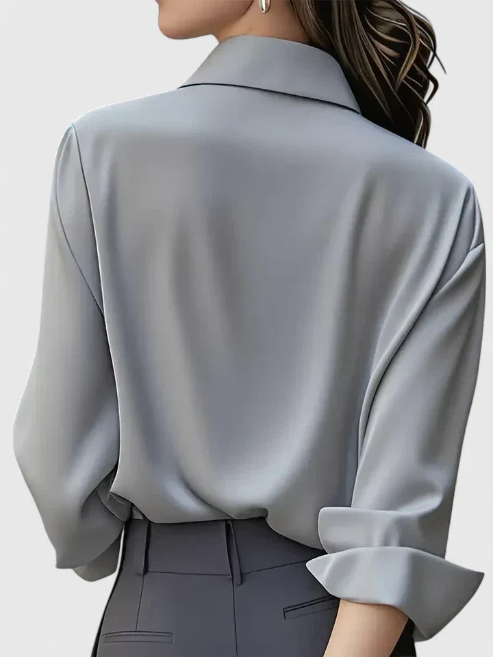 Women's long sleeve shirt with curved hem ideal for tucked or untucked styling