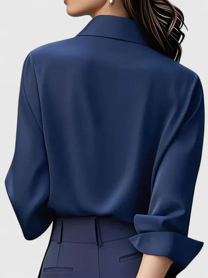 Long sleeve shirt with relaxed silhouette and curved hemline for versatile styling