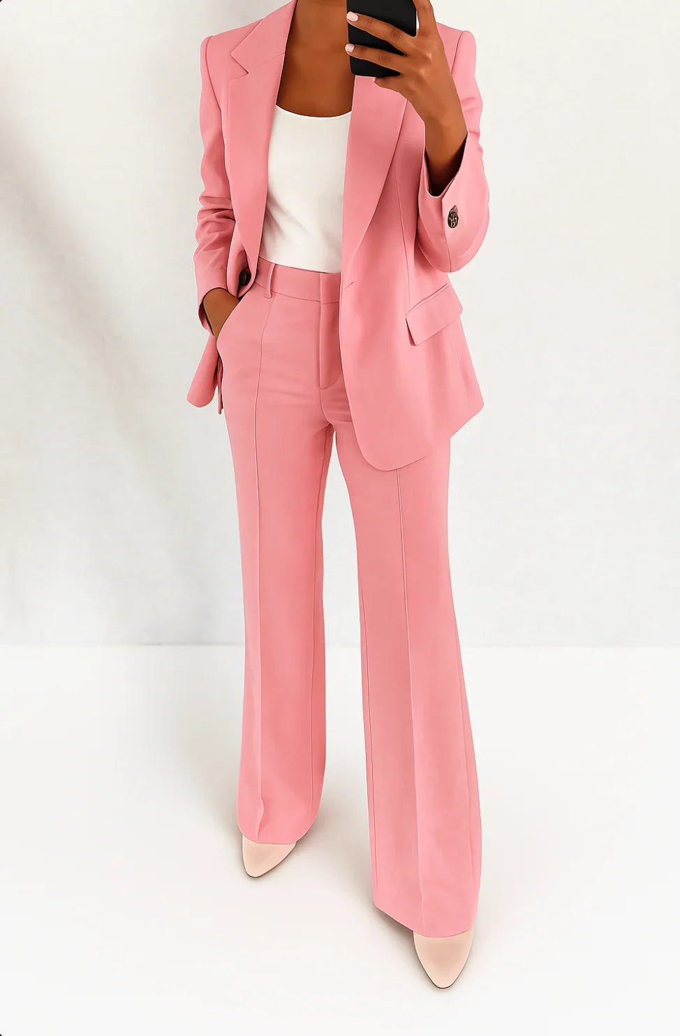Full length view of women's wide leg trouser suit showing coordinated silhouette