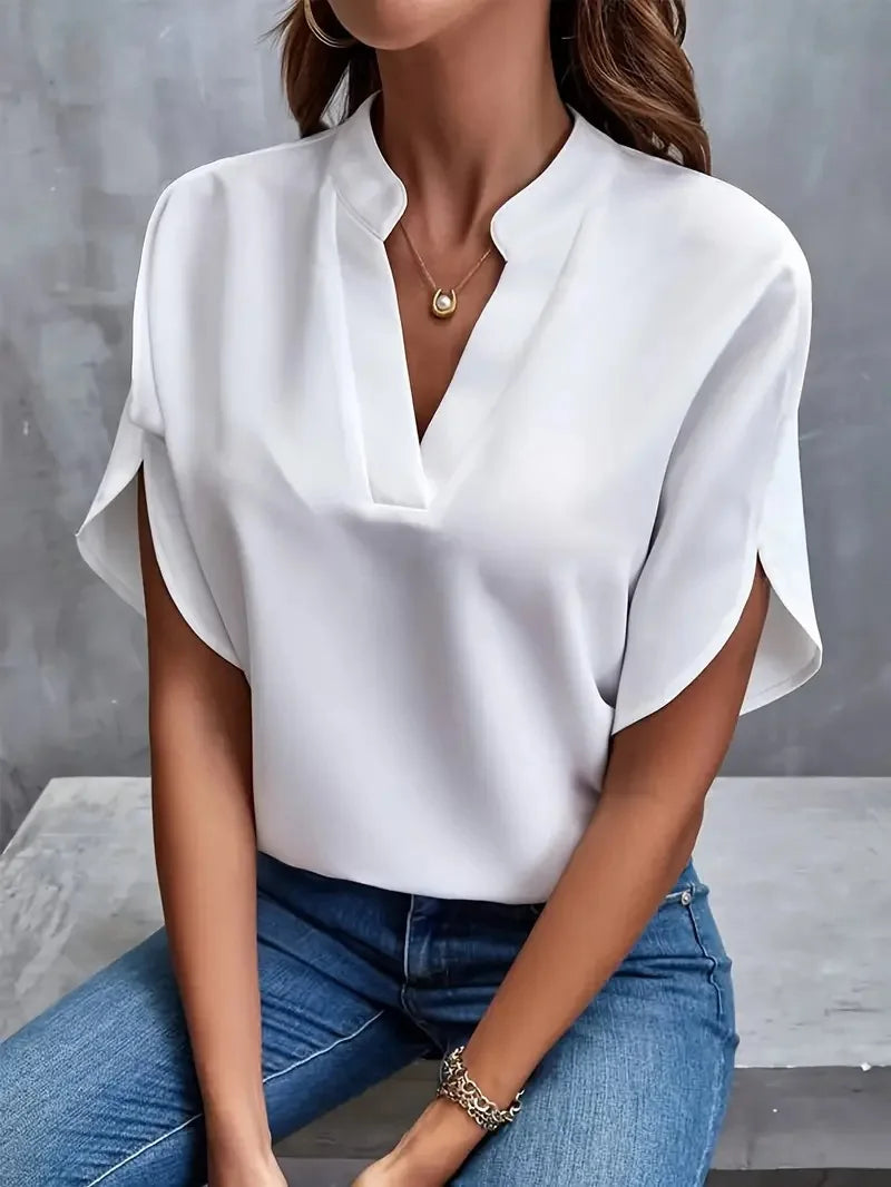 Women's V-neck blouse in white with flutter sleeves and relaxed fit for office wear