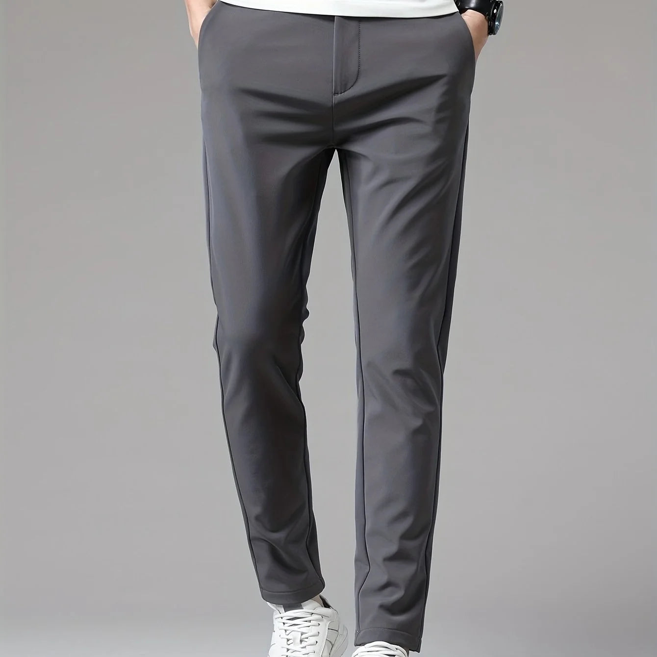 Full-length shot of men's slim fit trousers demonstrating versatile straight leg cut