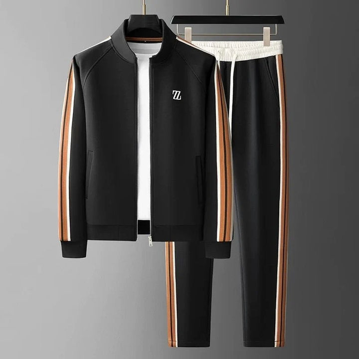 Men's tracksuit joggers waistband detail showing elasticated drawstring closure and smooth fabric