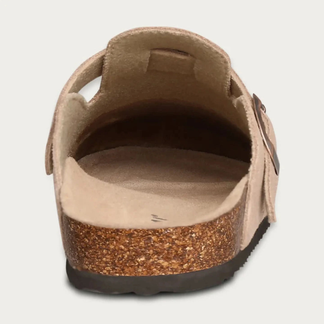 Pair of men's clogs with cork midsole and durable rubber outsole in neutral beige tone