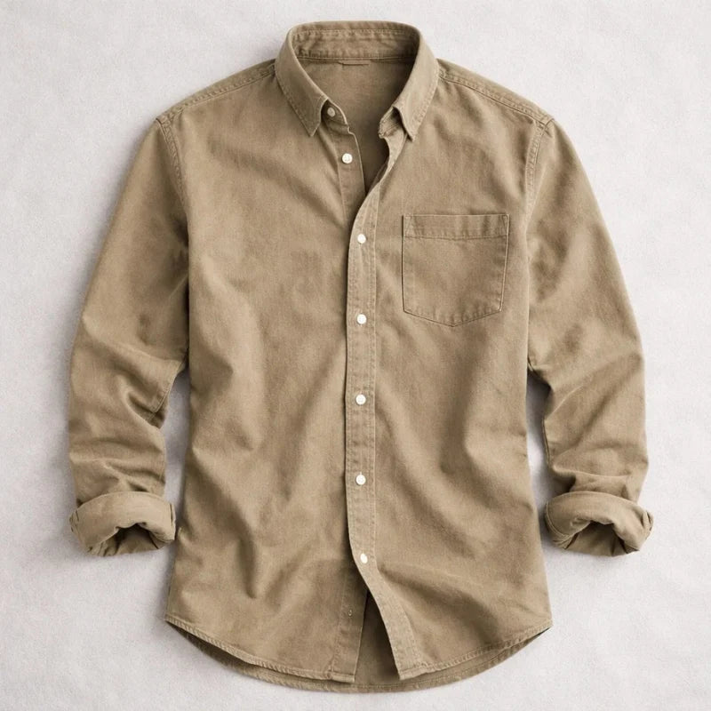 Men's long sleeve denim shirt with white button fastenings front view