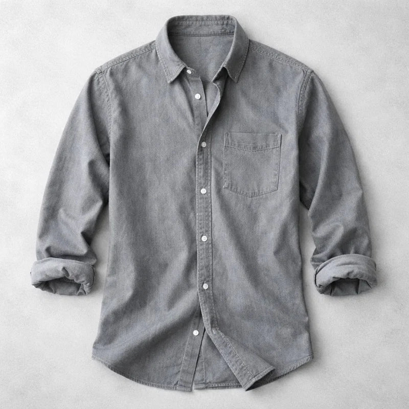 Men's woven denim shirt with full-length button placket and hip length